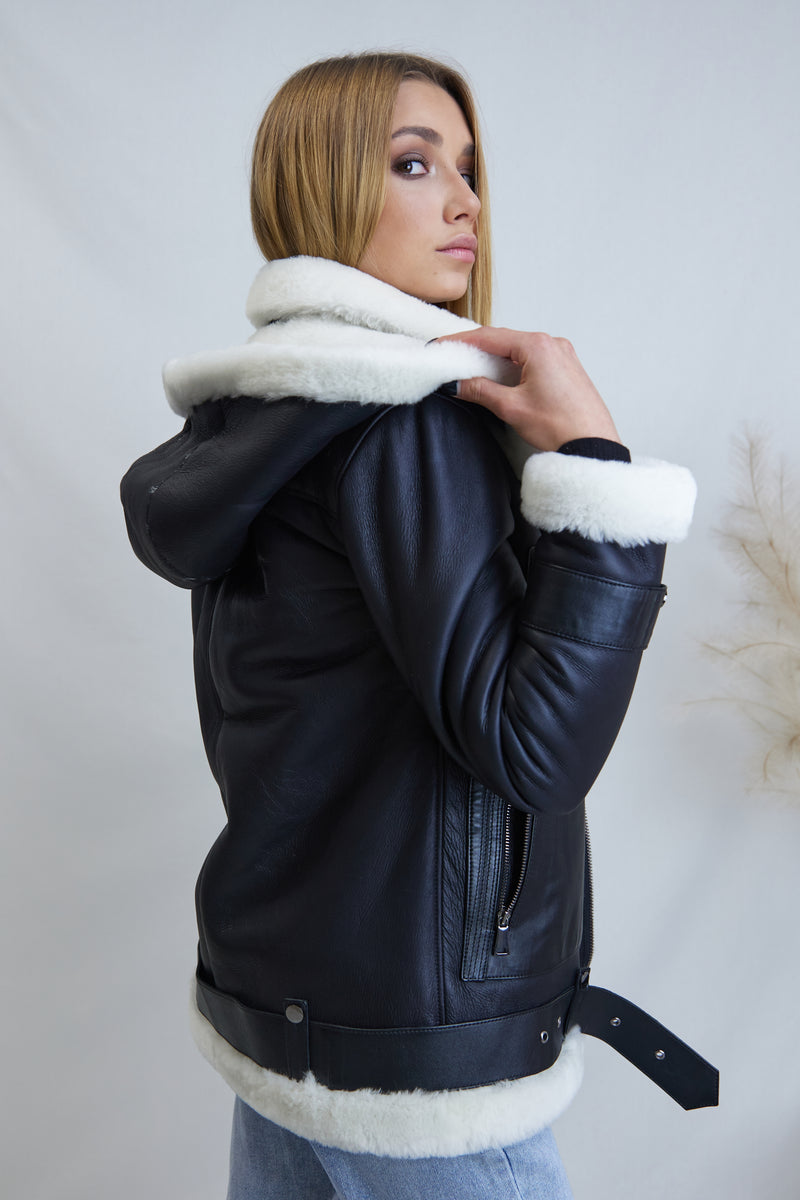 Natural sheepskin coat with a hood