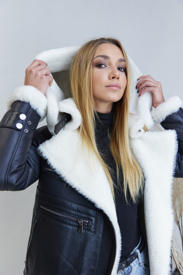 Natural sheepskin coat with a hood